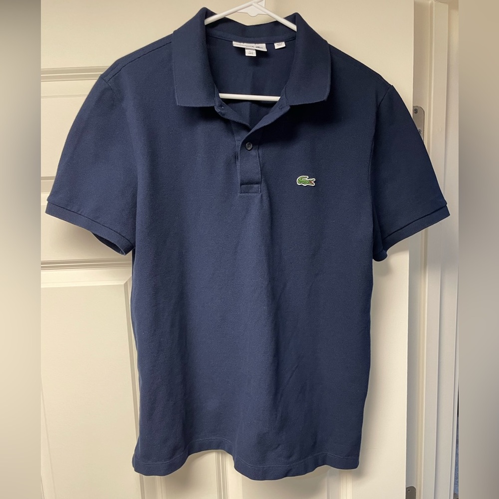 Like new. Lacoste polo shirt. Navy color. Slim fit. XL.